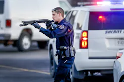 Police go through the parking lot of Excel Industries in Hesston, Kan., where a gunman reportedly killed up to seven people and injured many others on Thursday, Feb. 25, 2016. Police go through the parking lot of Excel Industries in Hesston, Kan., where a gunman reportedly killed up to seven people and injured many others on Thursday, Feb. 25, 2016.