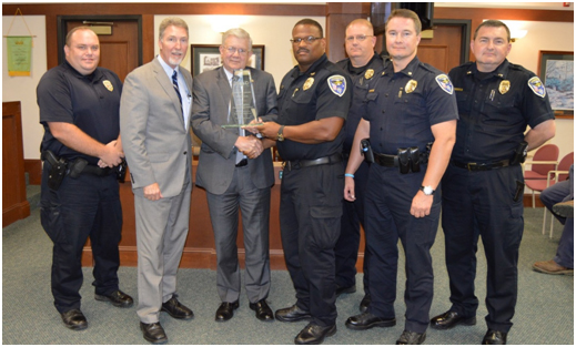 SIAC presents a dispatch reduction award to Lexington, S.C.: (L to R) Patrolman First Class Ryan Whitlock, Mayor Steve MacDougall, Glen Mowrey, Chief Terrence Green, Lt. Matt Timmerman, Major Matt Davis, and Lt. Thomas Stowe.