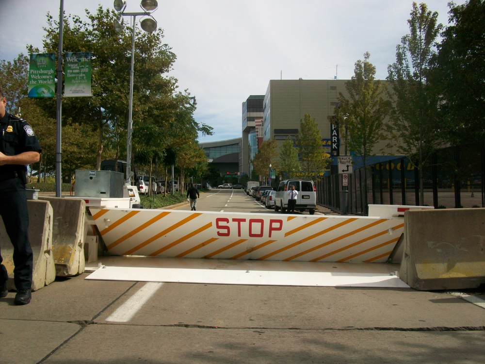 Portable barriers, such as Delta Scientific's MP5000 pictured above, can be towed into position to control vehicle access within 15 minutes. No excavation or sub-surface preparation is required.