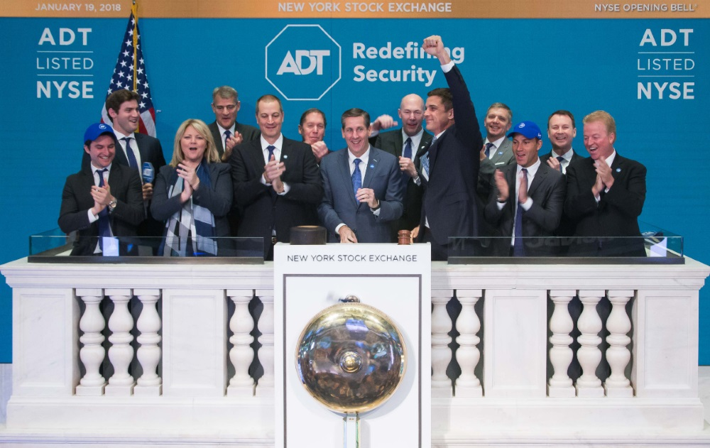 ADT, Inc. Chief Executive Officer Timothy J. Whall, joined by members of ADT's senior executive team and board of directors, rings the NYSE Opening Bell.
