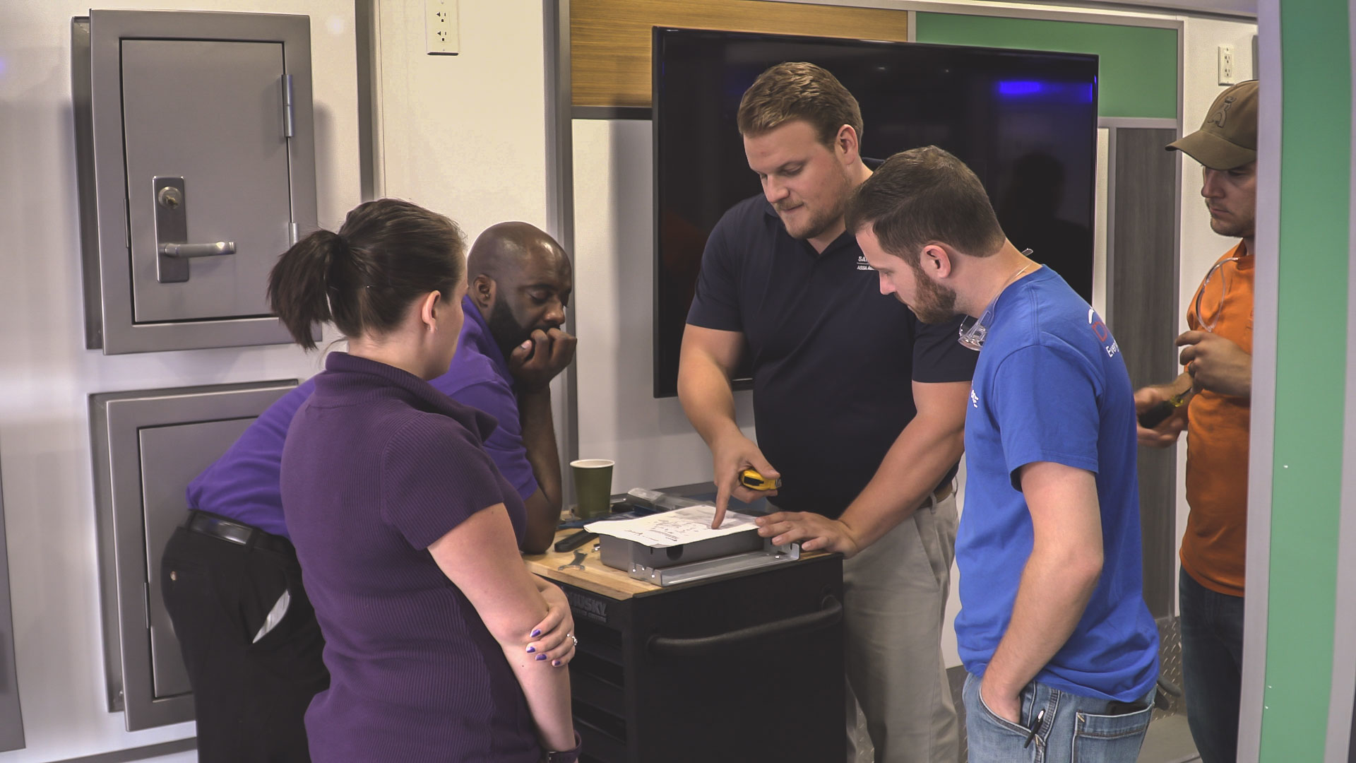 Dealers and integrators get hands-on experience with ASSA ABLOY products inside its Mobile Installation Training Showroom.