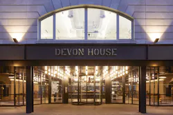 Devon House at St. Katharine Docks, an office building in London’s East Side, has installed a unique TQM manual revolving door at the main entrance, in addition to two arrays of Speedlane Swing optical turnstiles, to increase lobby security. Devon House at St. Katharine Docks, an office building in London’s East Side, has installed a unique TQM manual revolving door at the main entrance, in addition to two arrays of Speedlane Swing optical turnstiles, to increase lobby security.
