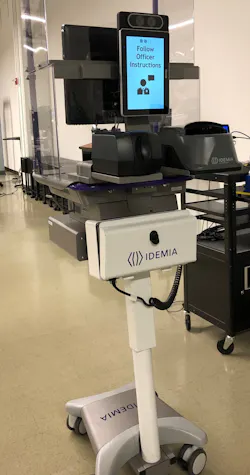 A look at the Idemia ID analysis machines in use for a pilot project at Ronald Reagan Airport. The officer stands behind the shield, and human-to-human contact is non-existent. A look at the Idemia ID analysis machines in use for a pilot project at Ronald Reagan Airport. The officer stands behind the shield, and human-to-human contact is non-existent.