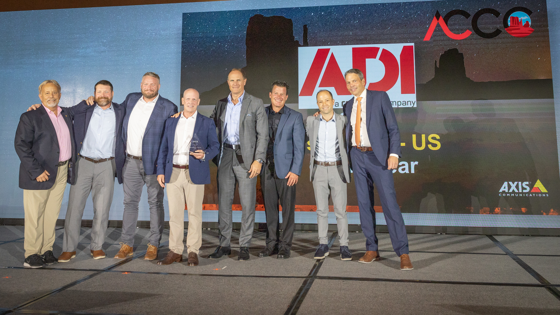 From left to right: Larry Newman, Sr. Director Sales, Axis; Russell Hough, National Distribution Account Manager, Axis; Nick Terry, Area Sales Manager, ADI; John Sullivan, SVP, Strategic Accounts, ADI; Rob Aarnes, President, ADI; Greg Carter, National Account Manager, ADI; Garrett Savage, Director Category Management U.S., ADI; Fredrik Nilsson, VP, Americas, Axis.
