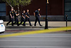 Law enforcement officers respond to an active shooter near the Old National Bank building on April 10, 2023, in Louisville, Ky. Five people are dead and at least six more have been hospitalized. Law enforcement officers respond to an active shooter near the Old National Bank building on April 10, 2023, in Louisville, Ky. Five people are dead and at least six more have been hospitalized.