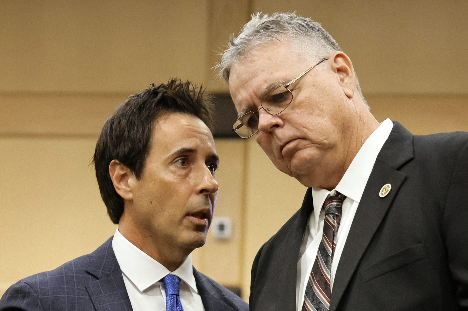 Former Marjory Stoneman Douglas High School School Resource Officer Scot Peterson, right, speaks with his defense lawyer Mark Eiglarsh following a hearing in 2022.