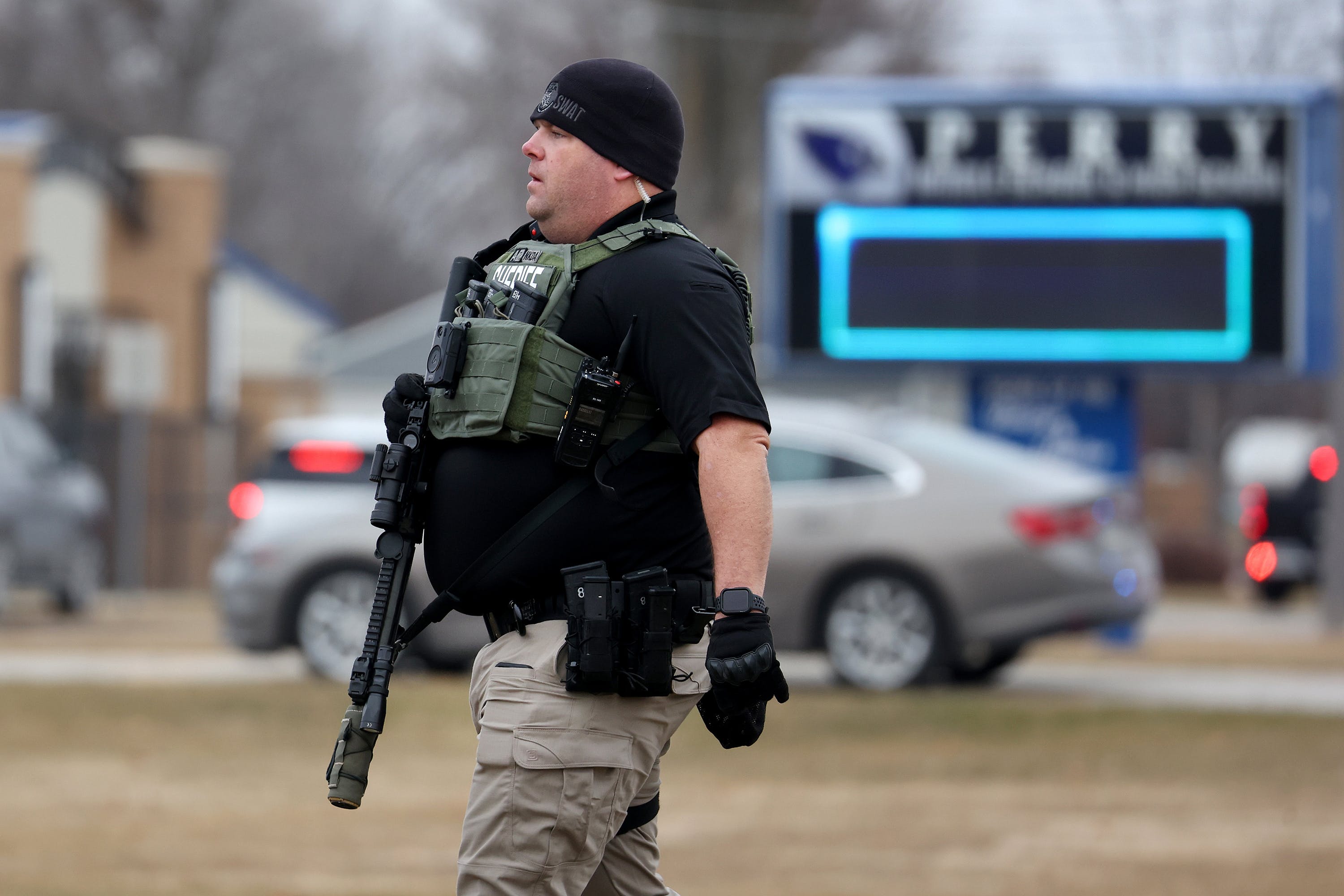 Police respond to a school shooting at the Perry Middle School and High School complex on Jan. 4, 2024 in Perry, Iowa. Students were returning to classes following the holiday break.