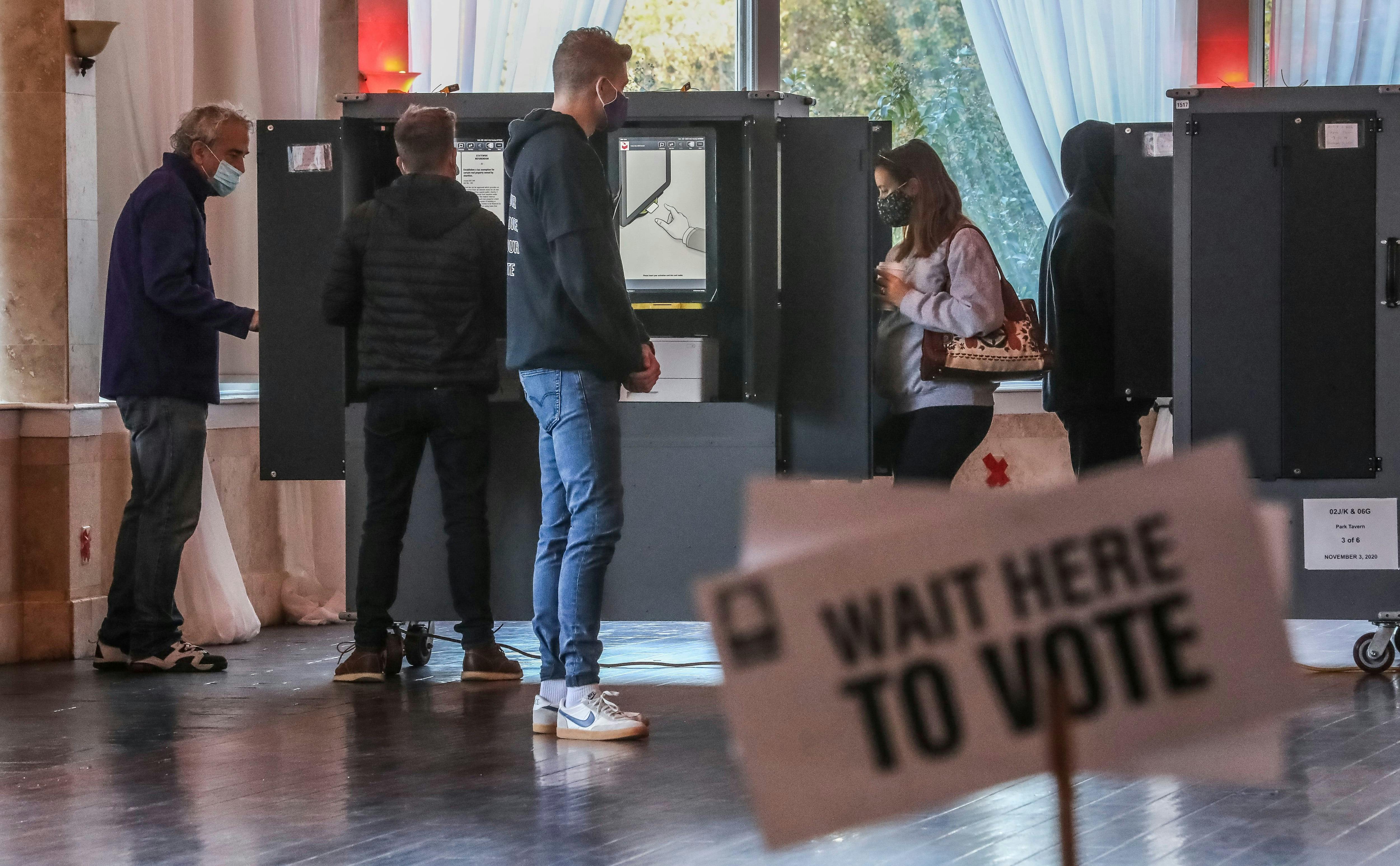 Voters at the voting machines at Park Tavern in Atlanta on Tuesday, Nov. 3, 2020.