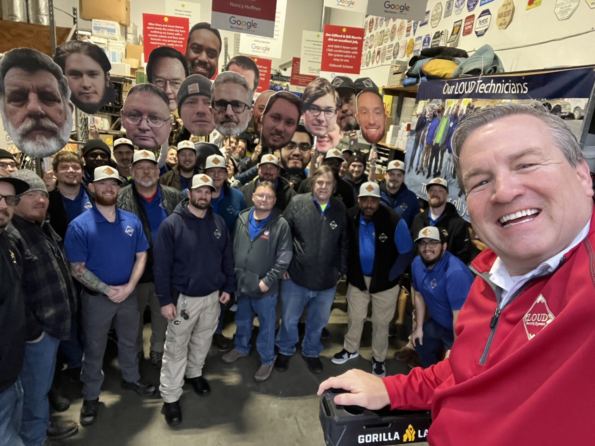 John Loud (right) threw a party for his technicians on Jan. 23 as part of National Security Technican Day.