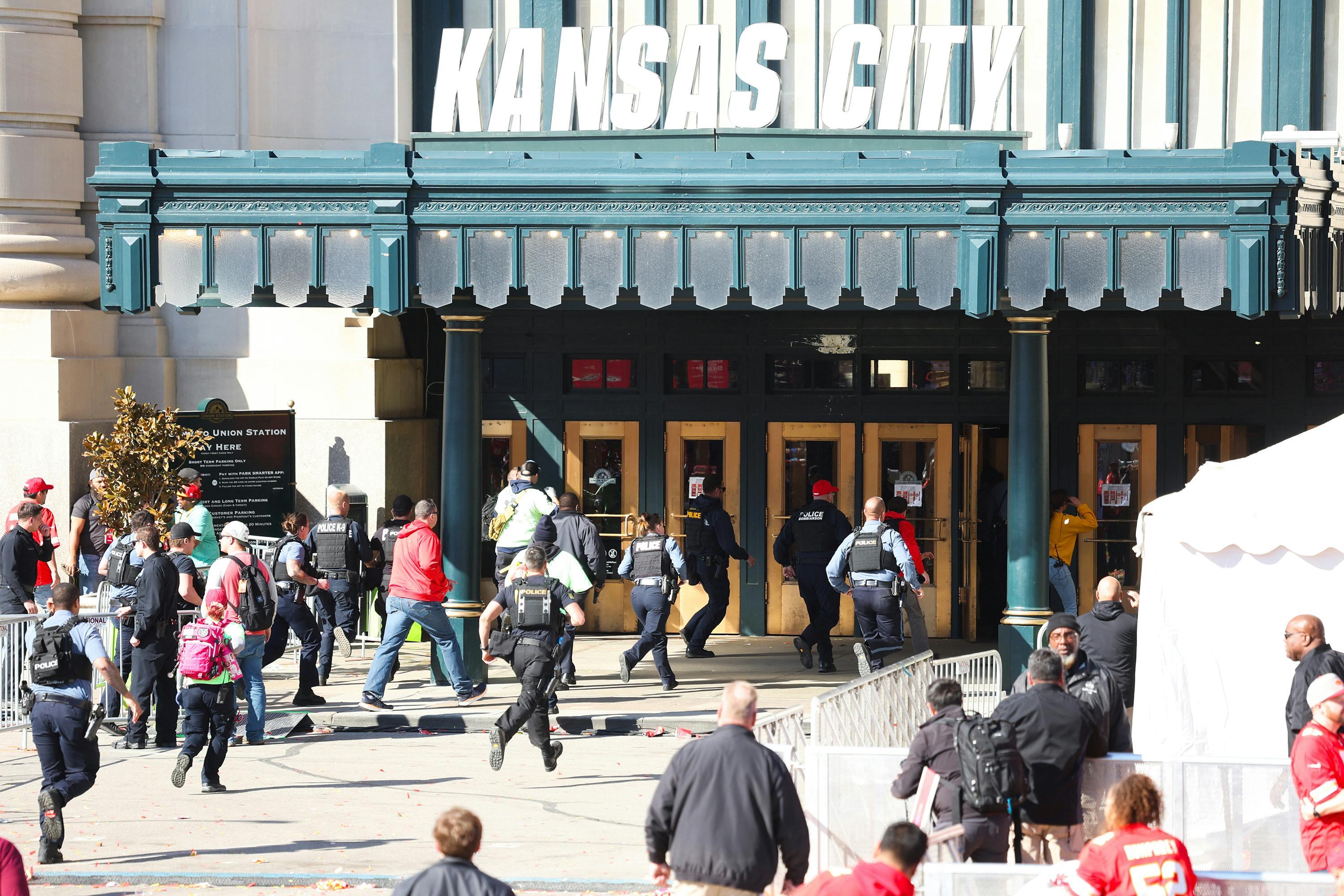 Law enforcement and medical personnel respond to a shooting at Union Station during the Kansas City Chiefs Super Bowl LVIII victory parade on Feb. 14, 2024, in Kansas City, Missouri. Several people were shot and two people were detained after a rally celebrating the Chiefs Super Bowl victory. (Jamie Squire/Getty Images/TNS)