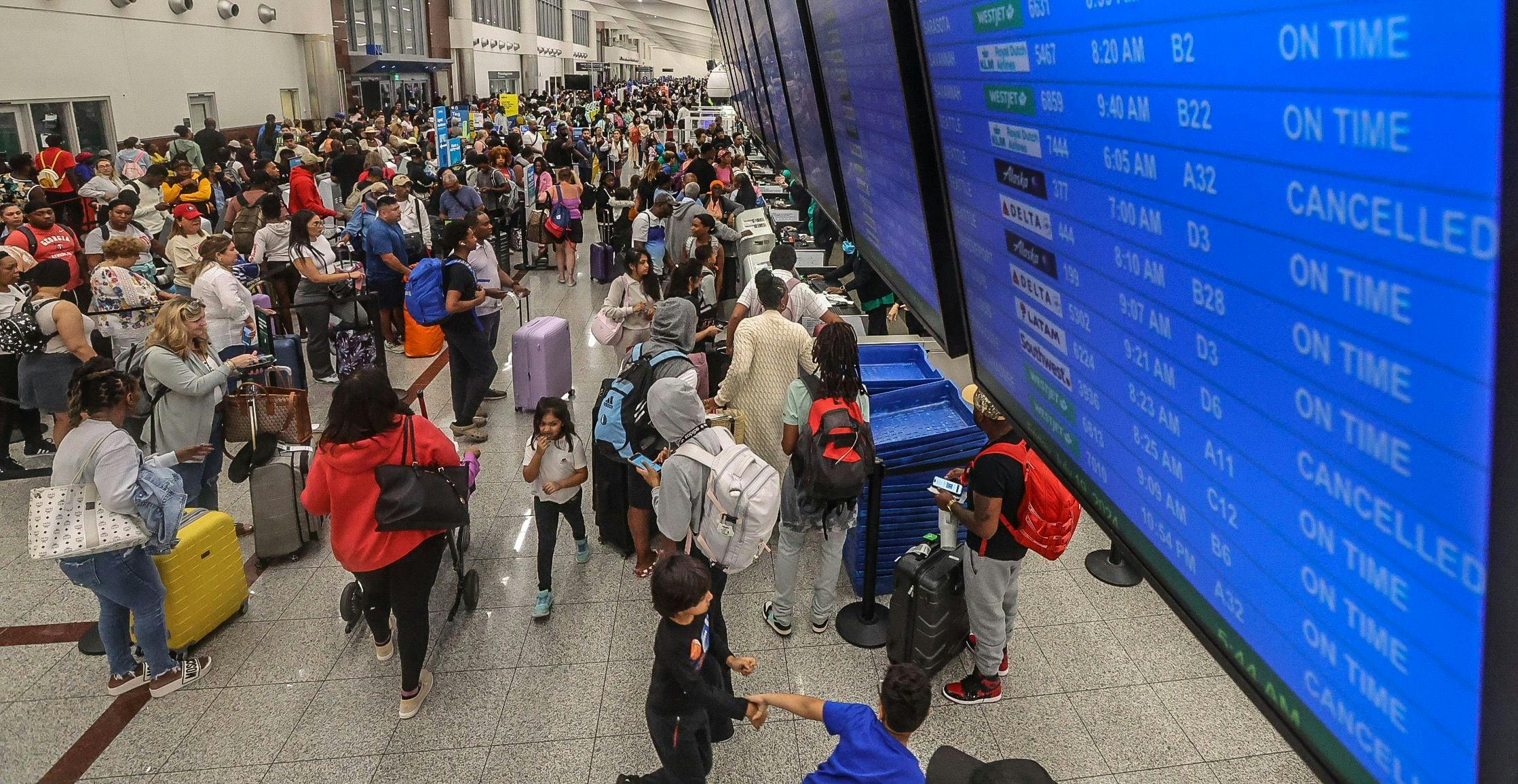 Passengers began to fill Hartsfield-Jackson International Airport early Friday morning, July 19, 2024 as a global Microsoft outage hit airlines.