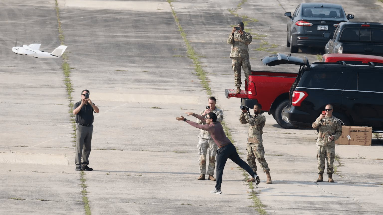 Soldiers and MITRE personnel conduct the initial testing of the CARPE Dronvm smartphone app during the launch of the testing drone. U.S. Army Central tested CARPE Dronvm at McEntire Joint National Guard Base and Poinsett Weapons Range, S.C., on July 18, 2023.