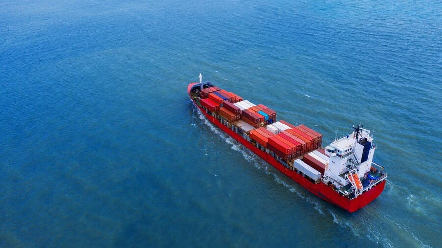 66f59424eafad2d8287b475b Aerialviewcontainercargoshipsea 335224715