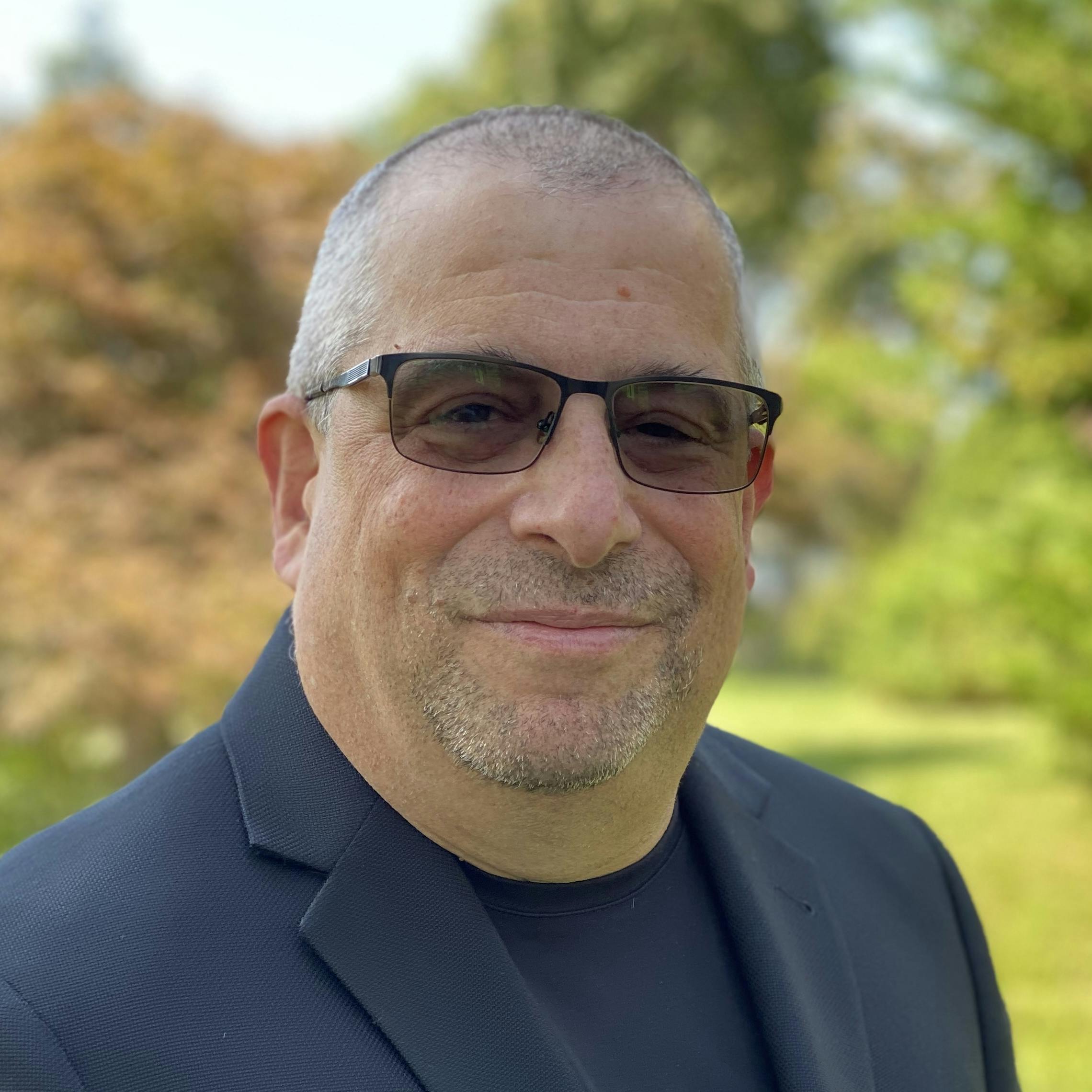 671fe0886d6f5fcf71c9b2a6 Gollotti Casual Headshot