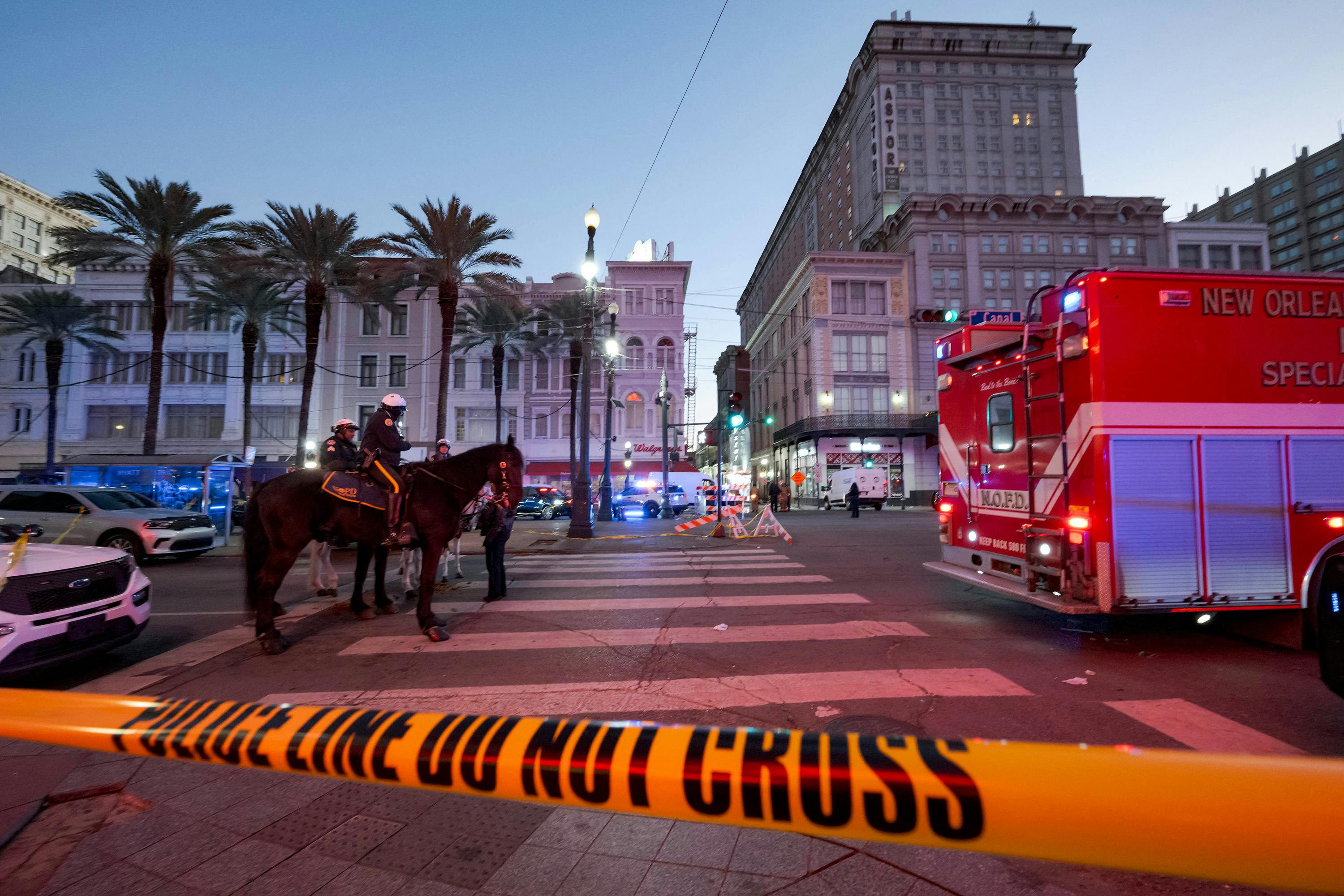 Police cordon off the intersection of Canal Street and Bourbon Street in the French Quarter of New Orleans on Wednesday, Jan. 1, 2025. At least 15 people were killed and 30 injured Wednesday when a vehicle plowed overnight into a New Year's crowd in the heart of the thriving New Orleans tourist district, authorities said.
