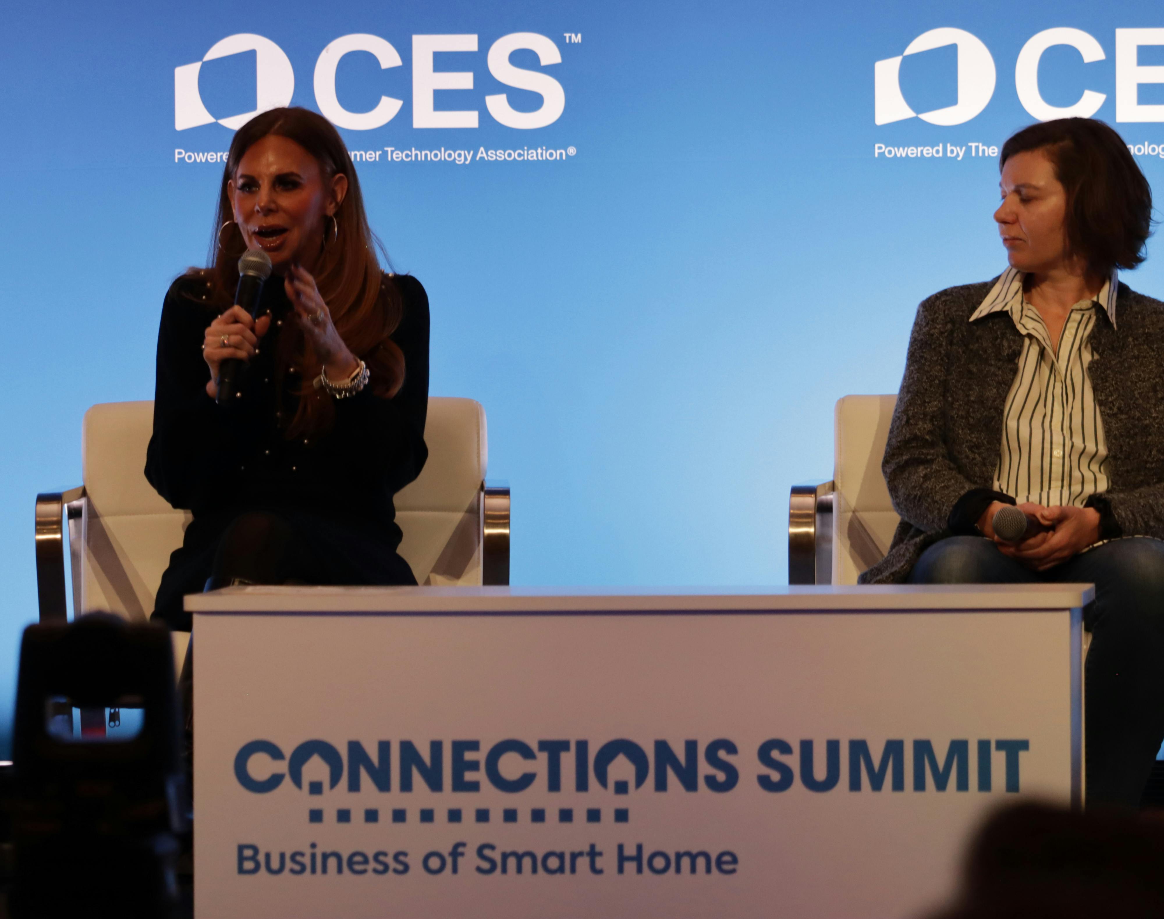 (Left) Melissa Andresko, Chief Corporate Brand Ambassador for Lutron Electronics, talks smart lighting during the recent Parks Associates Connections Summit at CES, as Agnes Lorenz, VP of Zooz, looks on.