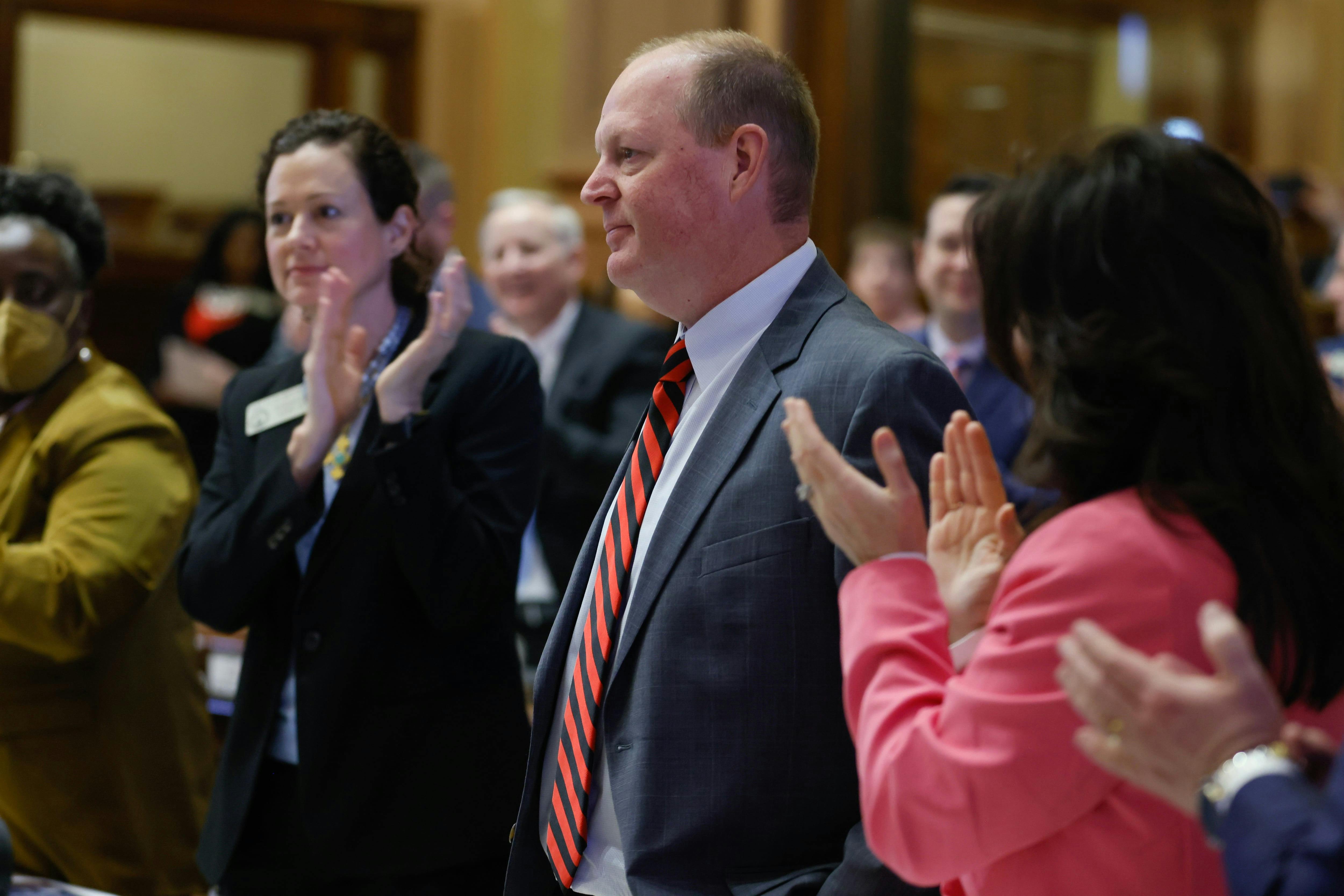 Members of the House of Representatives welcome Rep. Holt Persinger, R- Winder, on his first day of the legislative session on March 6, 2023. Persinger is the sponsor of House Bill 268, a hefty piece of legislation that seeks to keep schools safe, in part, by sharing some students behavioral health information.