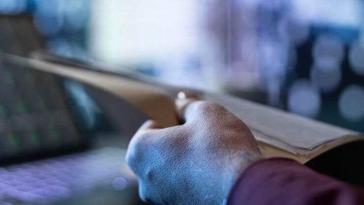 681d03f48cc0a00026c74ba9 Chiefexecutiveofficerreadingaccountingpaperworkens