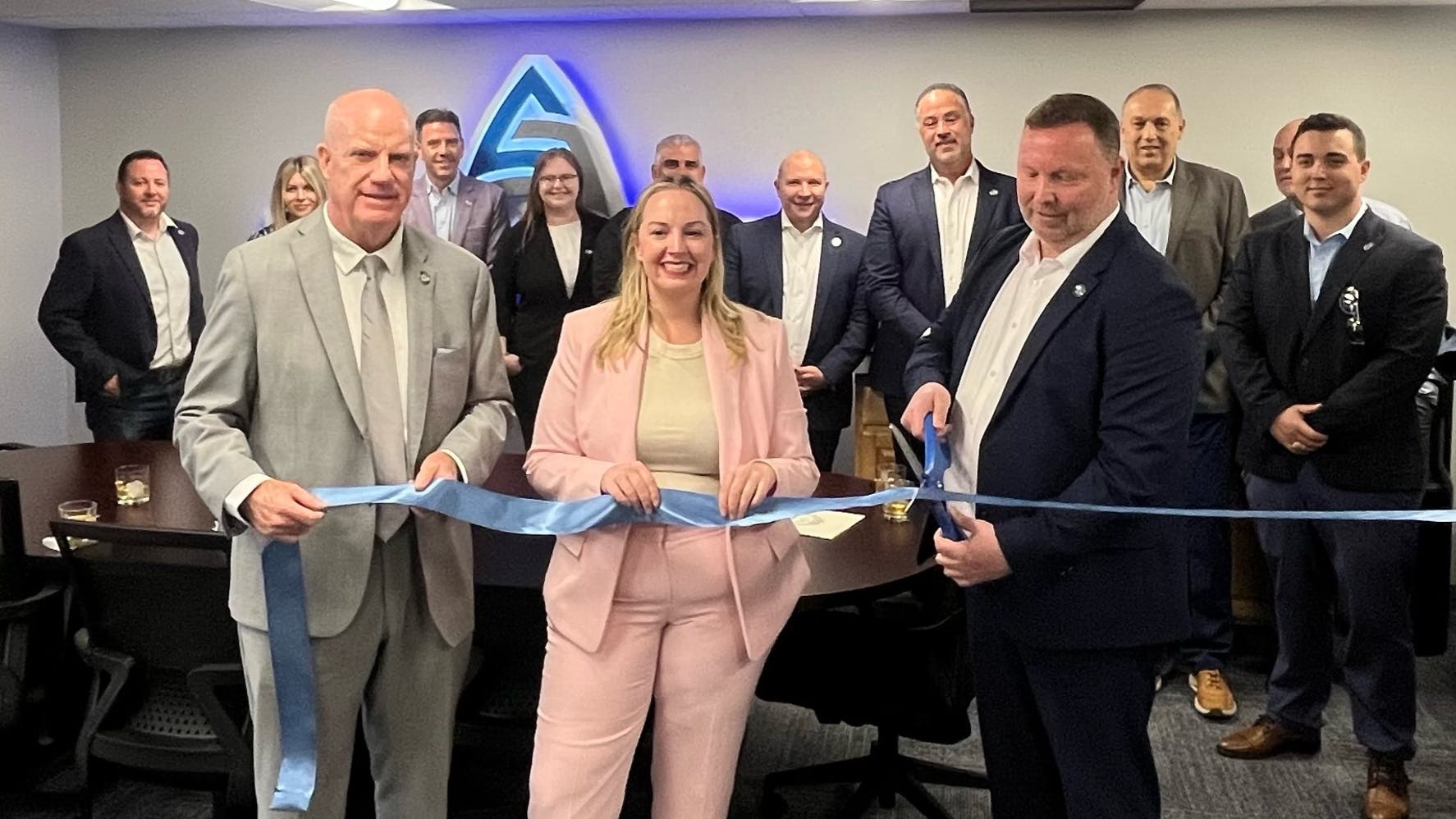 Arrow Security leadership, local officials, and business leaders gather at the grand opening of Arrow Security&rsquo;s new Boston office on Friday, May 16. AJ Caro, Chief Executive Officer of Arrow Security (right), Sharon Durkan, Boston City Councilor, District