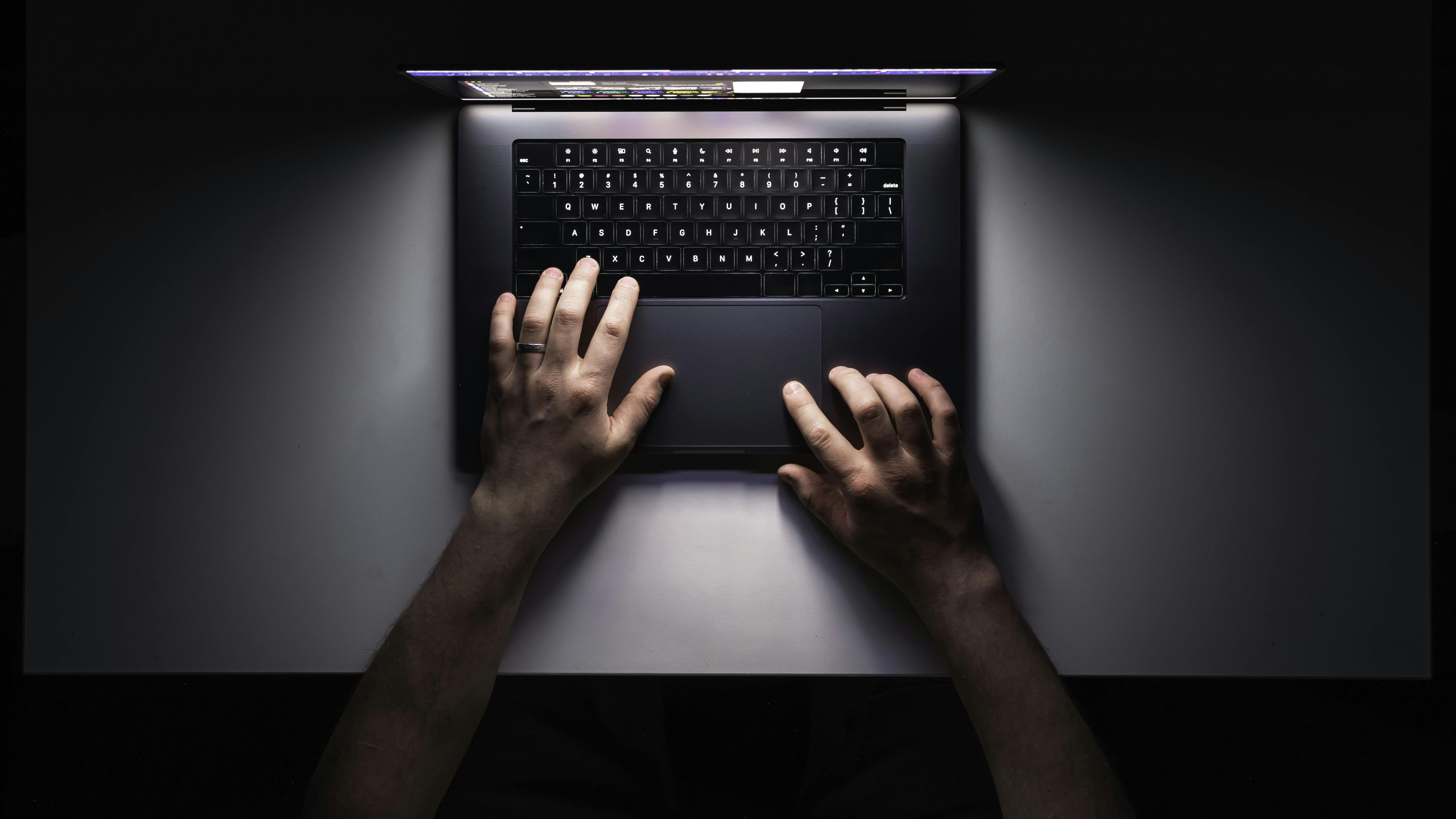 685da8554093ffe5e223696f Manusinglaptopnightworkplacetopview