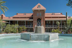The Old Main Entrance at the University of Arizona, where the university serves nearly 53,000 students across a 392-acre campus in Tucson, Arizona. AoA just completed an innovative retrofit of its access control and ID system. The Old Main Entrance at the University of Arizona, where the university serves nearly 53,000 students across a 392-acre campus in Tucson, Arizona. AoA just completed an innovative retrofit of its access control and ID system.