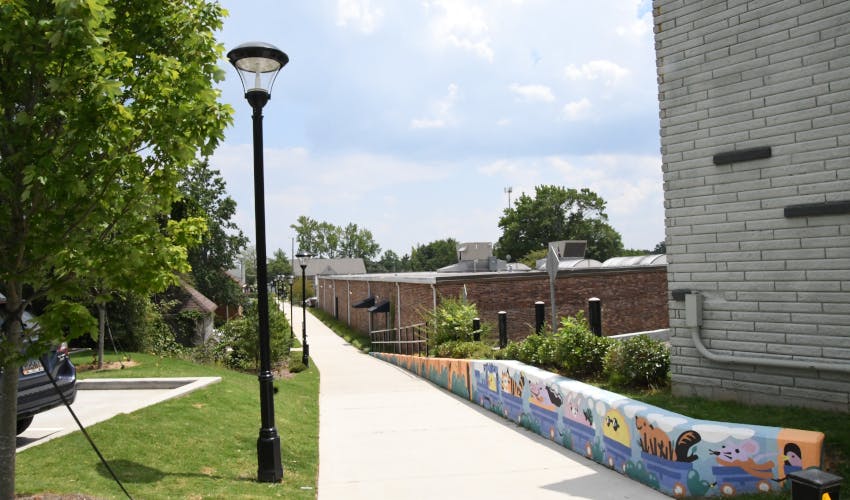 Smart lighting fixtures installed along a public trail in Tucker, Ga., integrate security cameras, video analytics and public WiFi to enhance safety and connectivity.