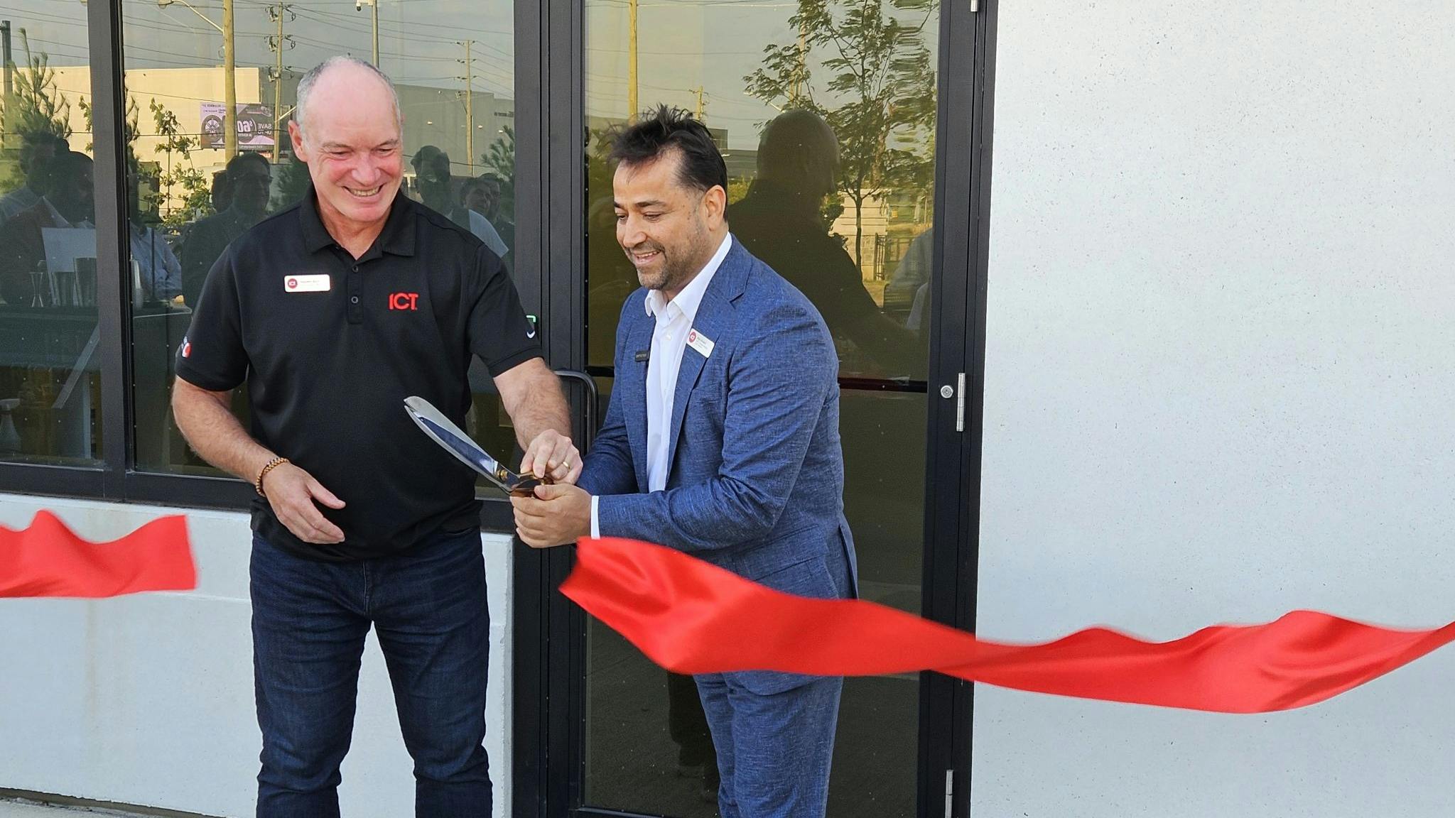 Cutting of the ceremonial ribbon at the grand opening of ICT's new HQ in Canada.