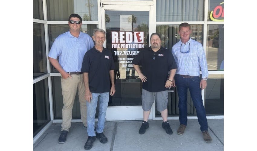 Pye-Barker and Red E Fire team members at the newly acquired company's headquarters in Las Vegas.