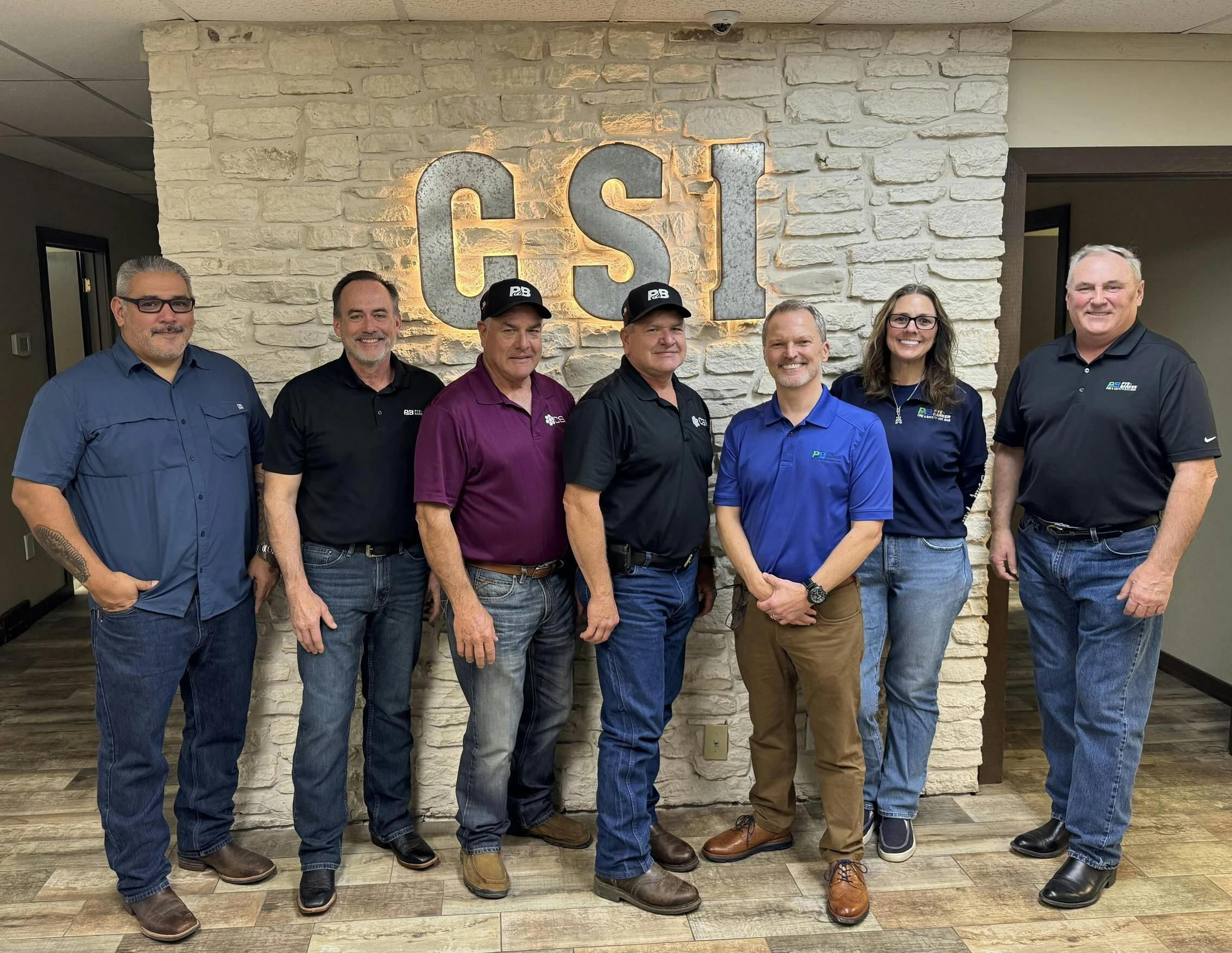 Carl Lyssy, Roger Lyssy and Pye-Barker team members following the acquisition of CSI, which expands service capabilities across Texas.