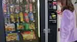 TV dinners in a frozen machine have heating instructions on the package. This machine is serviced by Automat Vending Inc., Yakima, Wash. TV dinners in a frozen machine have heating instructions on the package. This machine is serviced by Automat Vending Inc., Yakima, Wash.