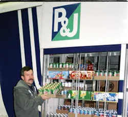 Driver Jay Hathaway loads a truck at P & J's Vending. The telemetry allows the company to know specifically what the location needs. Driver Jay Hathaway loads a truck at P & J's Vending. The telemetry allows the company to know specifically what the location needs.