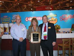 Paul Schindelar (right), Kraft Vending & OCS, honors the Automatic Merchandiser 2008 Route Driver of the Year, Nina Williams, and general manager Larry Pugh, Mid-South Food Services, Aberdeen, N.C. Paul Schindelar (right), Kraft Vending & OCS, honors the Automatic Merchandiser 2008 Route Driver of the Year, Nina Williams, and general manager Larry Pugh, Mid-South Food Services, Aberdeen, N.C.