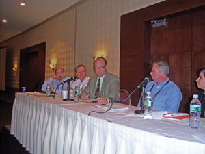 At left, Steve Silha, LaVazza, Mike Jones, john conti Coffee Co., Kevin Daw, KNJ Sales, and Paul Schindelar, Kraft Vending & OCS address the gathering.