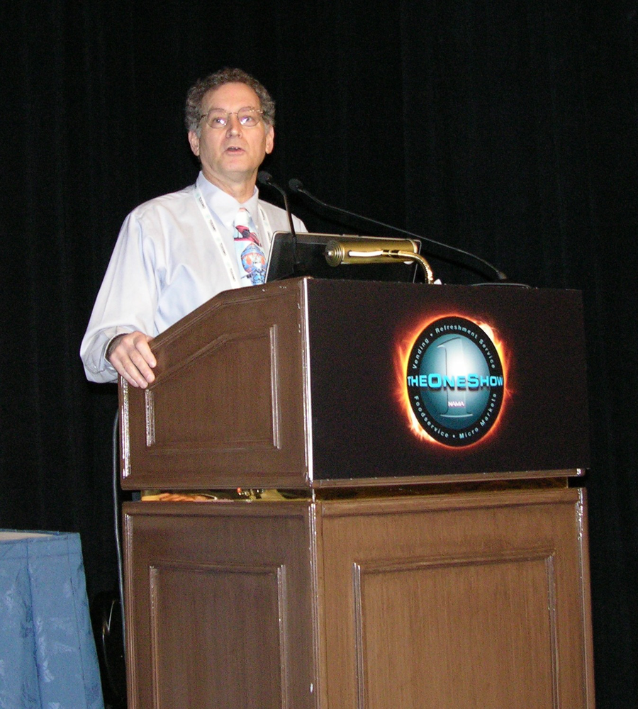 Apriva's Executive Vice President for Strategic Accounts, Rinaldo Spinella, speaks at the 2013 NAMA OneShow.