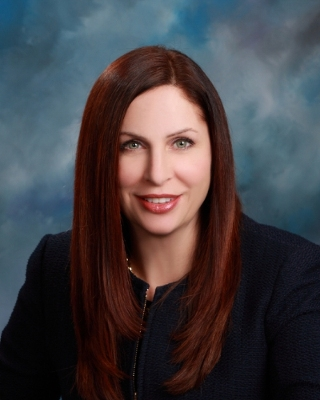 Jeannette L Knudsen