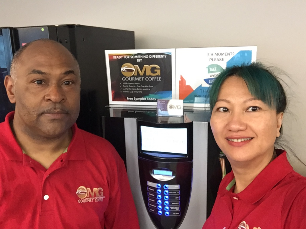 Donald and Xuan Whiting, OMG Gourmet Coffee highlight a Bianchi coffee brewer.