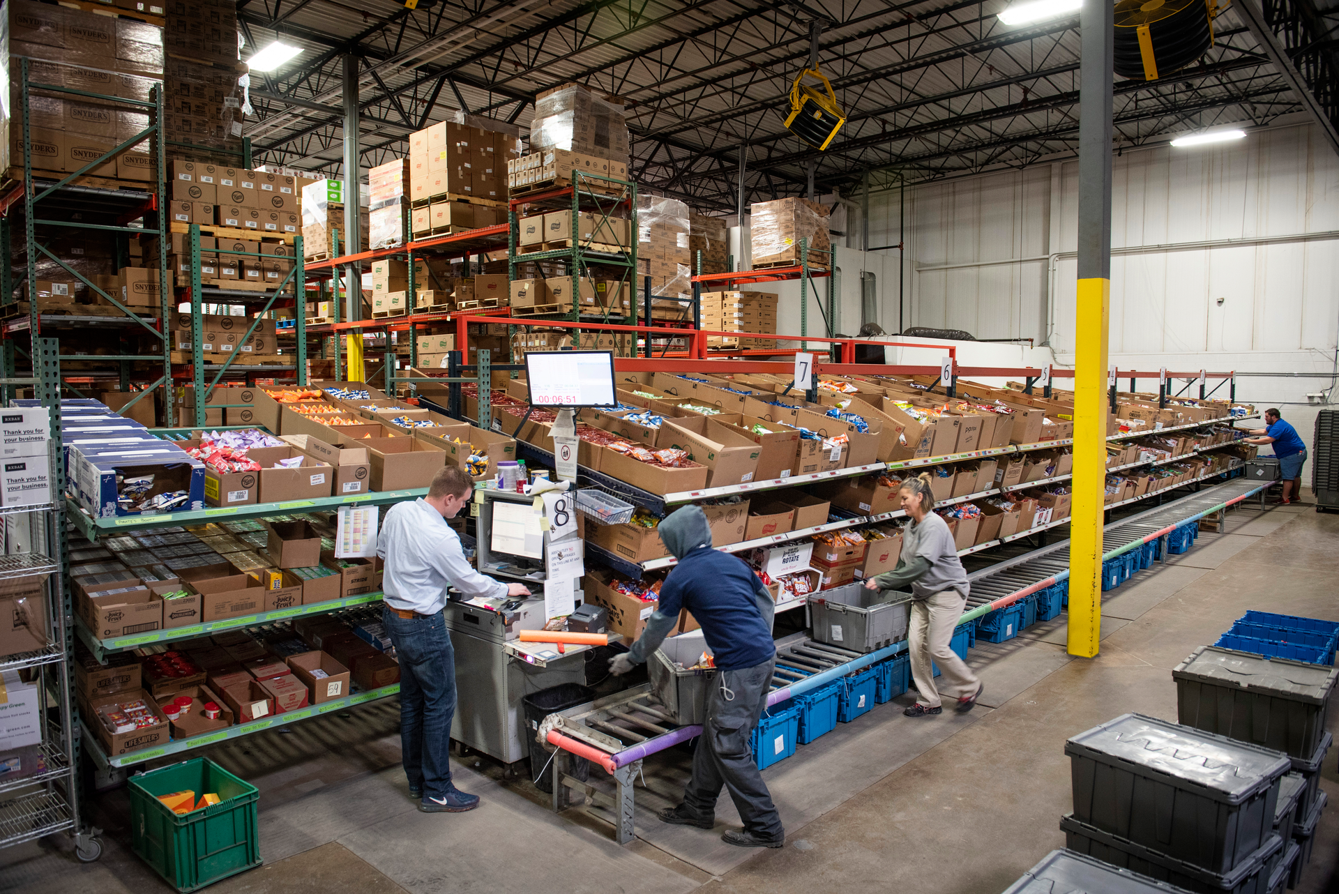 The re:fresh team in action on the LightSpeed prekitting line.