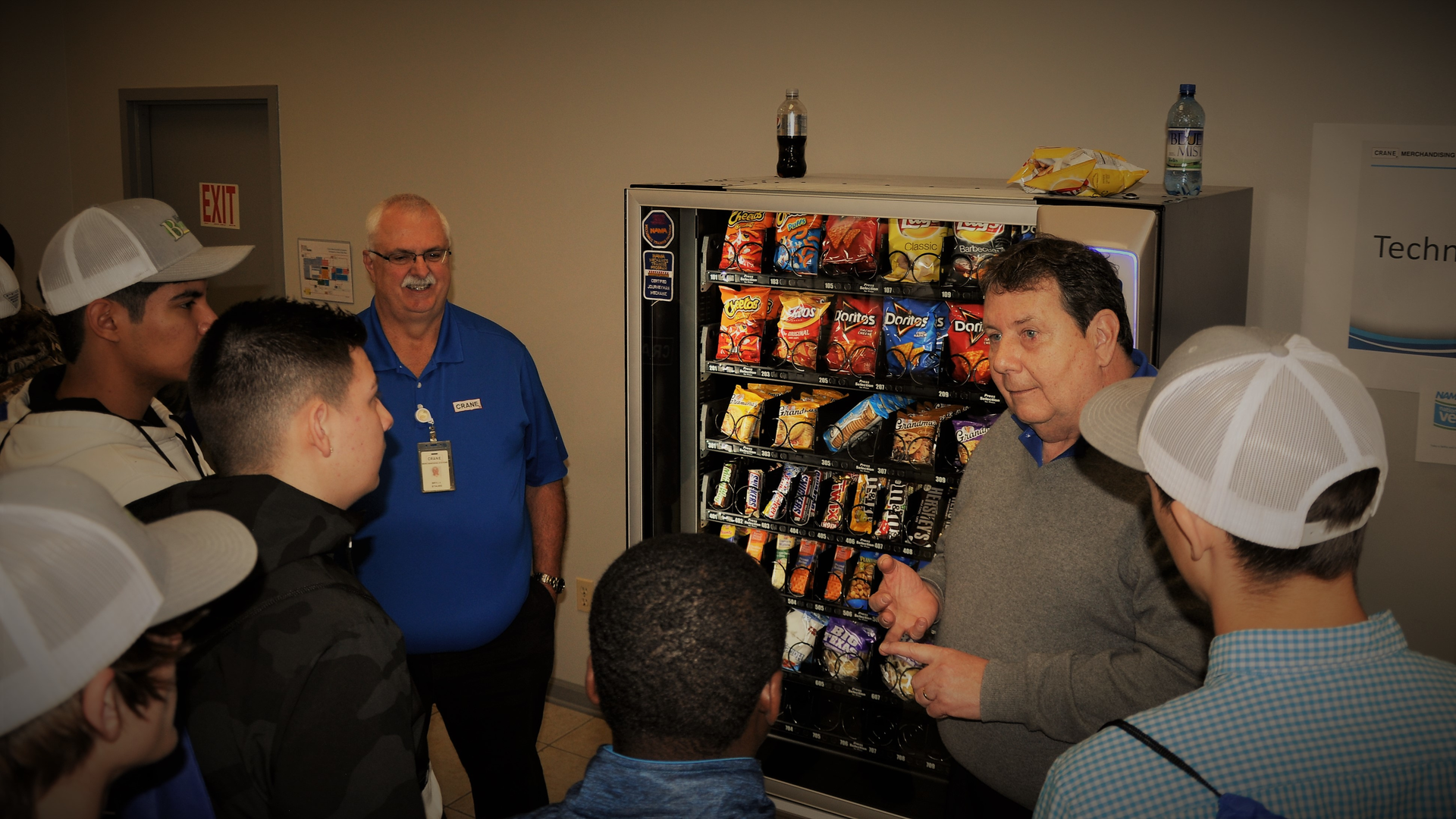 Crane Merchandising Systems associates showcase opportunities in the vending industry to middle school students at the company's 2019 Career Day. The event, held March 7, was part of Crane's celebration of the inaugural National Vending Day.