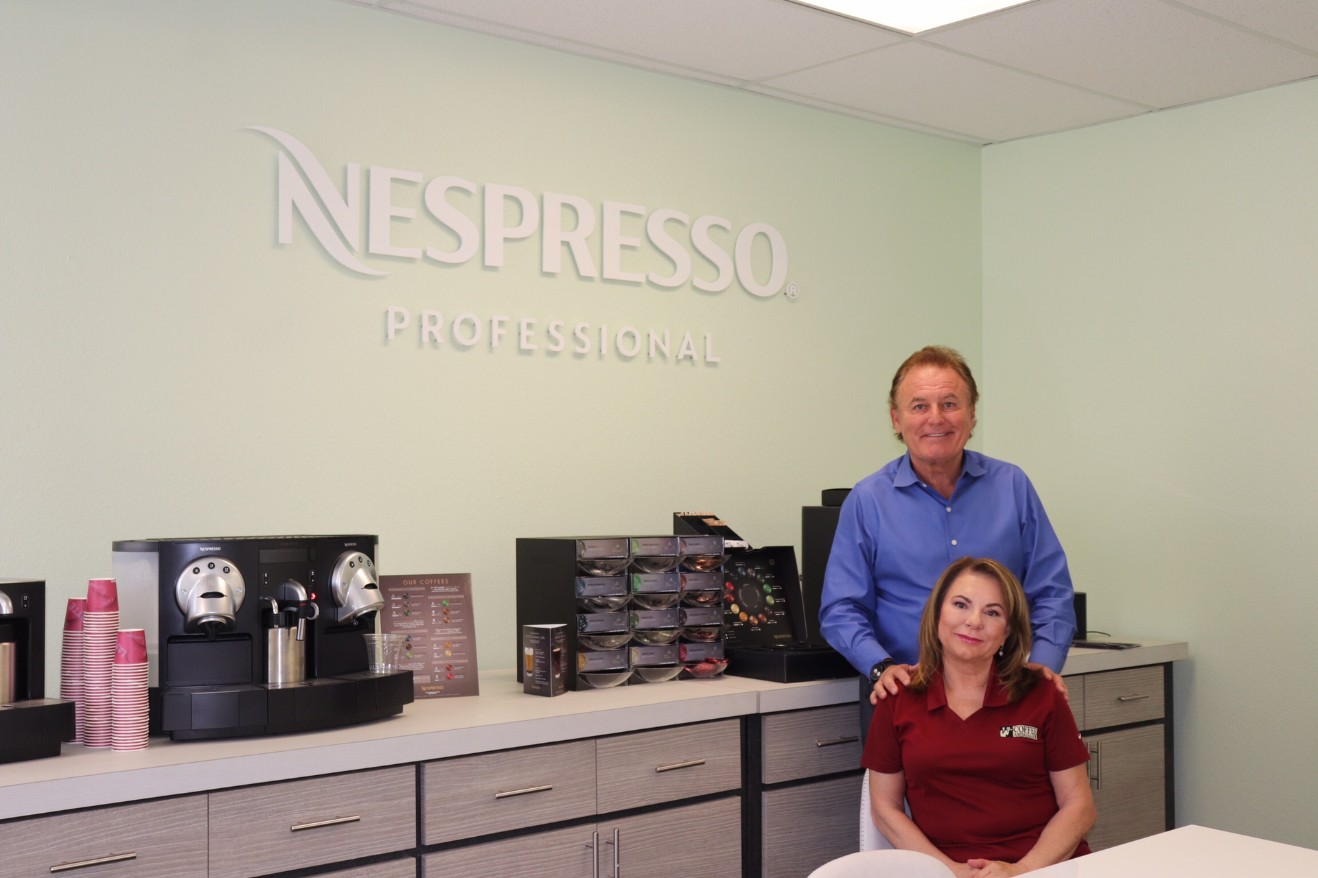 Sean Curtis and Barbara Curtis Smalley in the Nespresso tasting room at Coffee Ambassador.