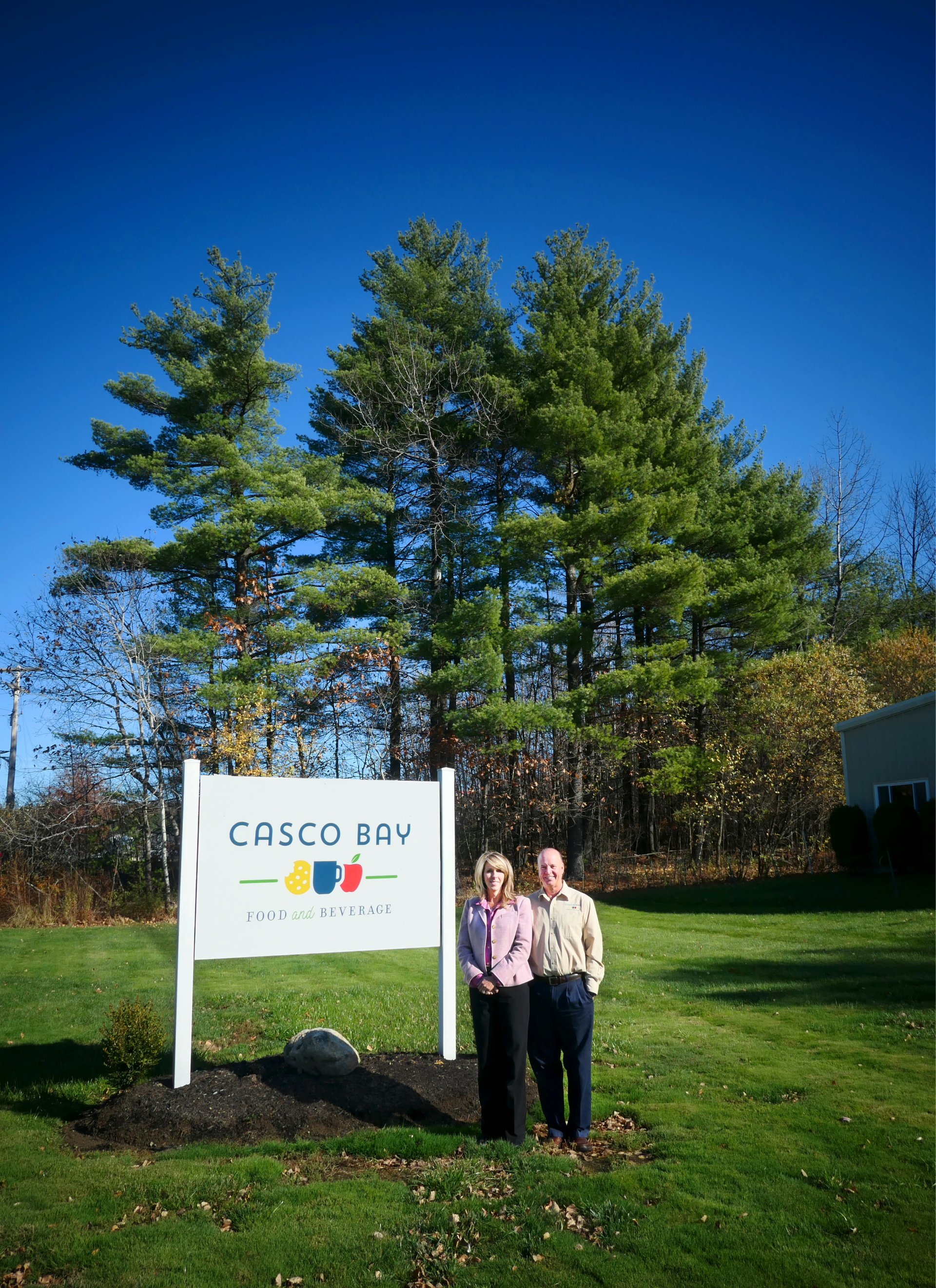 On a brisk autumn day with clear blue skies, Ted and Niki Morton are in front of the company's Lewiston corporate offices.