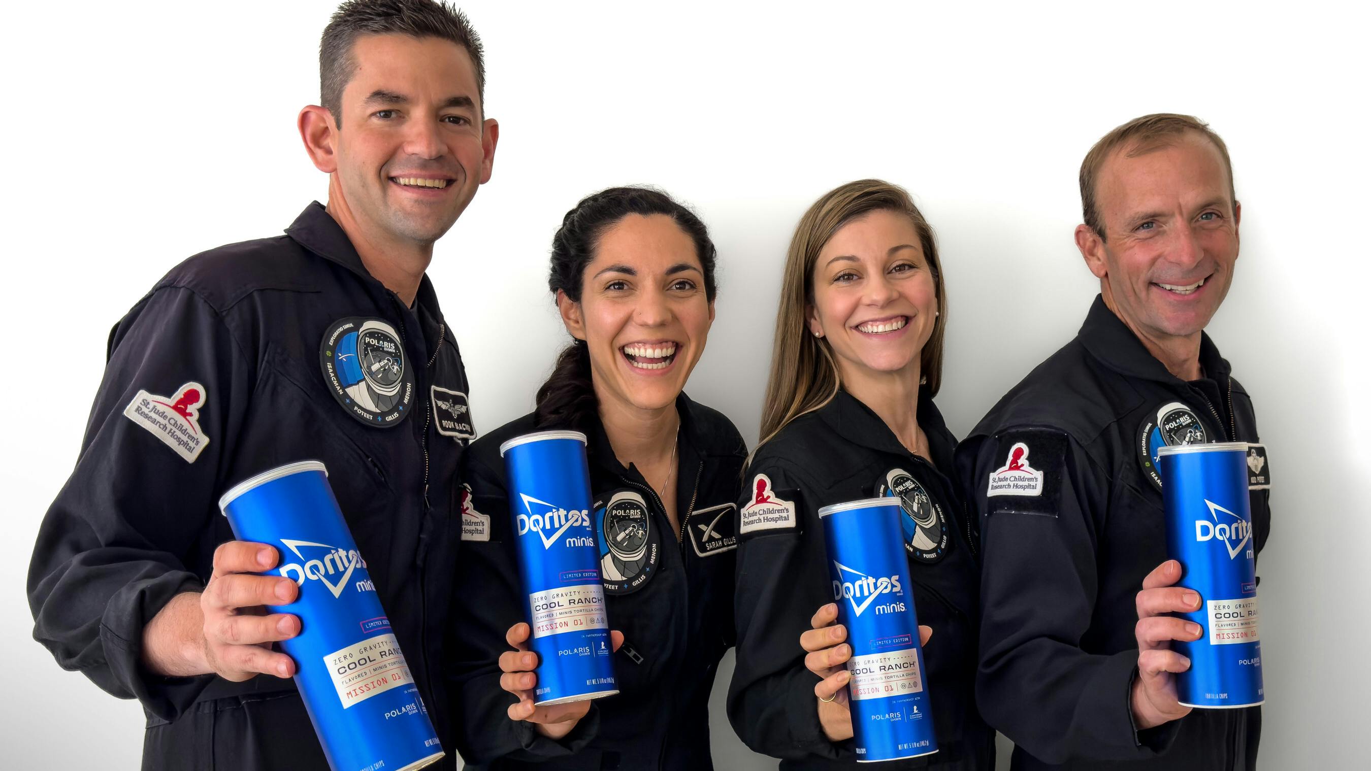 The crew of Polaris Dawn will have minis Cool Ranch Zero Gravity flavored tortilla chips when their mission launches on August 26. Shown from left: Jared Isaacman, mission commander; Sarah Gillis, mission specialist; and Anna Menon, mission specialist and medical doctor; Scott Poteet, mission pilot