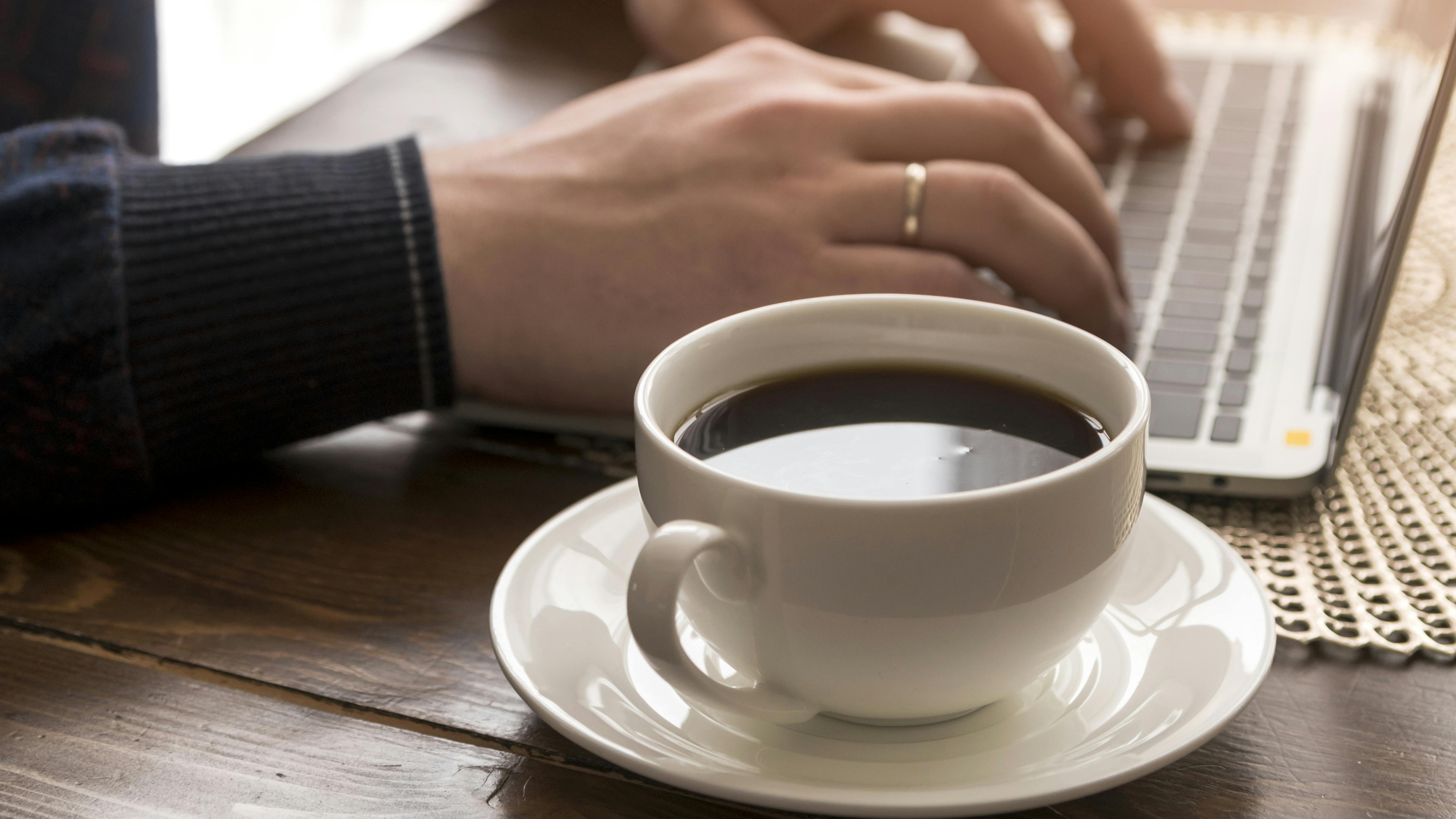 man working laptop coffee