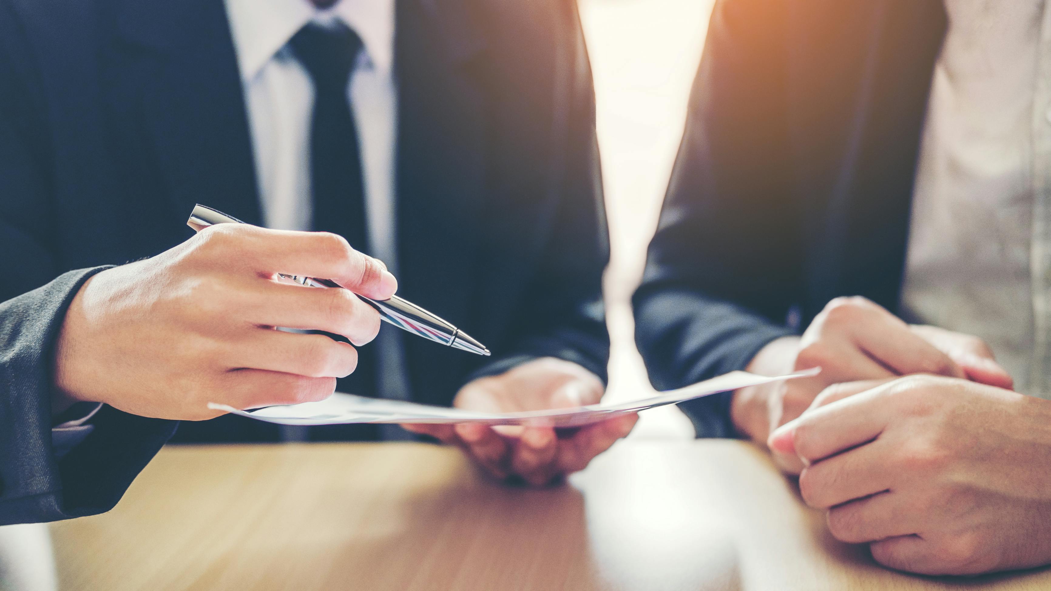 two business people negotiating a deal