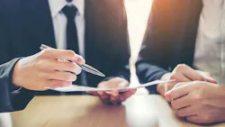 two business people negotiating a deal two business people negotiating a deal