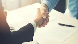 handshake across desk dreamstime_xxl_94512900 handshake across desk dreamstime_xxl_94512900