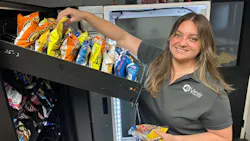 Mariah Silva, a partner at Vendo Snacks, restocks a client location. vending convenience services Mariah Silva, a partner at Vendo Snacks, restocks a client location. vending convenience services