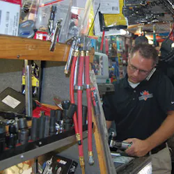 Matt Sledge makes arrangements for the silent auction on July 30 in LaVergne, Tenn. Matt Sledge makes arrangements for the silent auction on July 30 in LaVergne, Tenn.