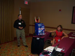 Joe Mocerino and Kim Cottle of Associated Equipment discuss the benefits of AGM batteries during the Ace Tool Co. dealer expo. Joe Mocerino and Kim Cottle of Associated Equipment discuss the benefits of AGM batteries during the Ace Tool Co. dealer expo.