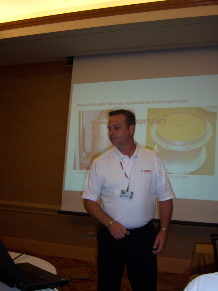 Scott McEwen tells ISN attendees that Bosch Automotive will maintain the OTC brand name for most diagnostic tools.