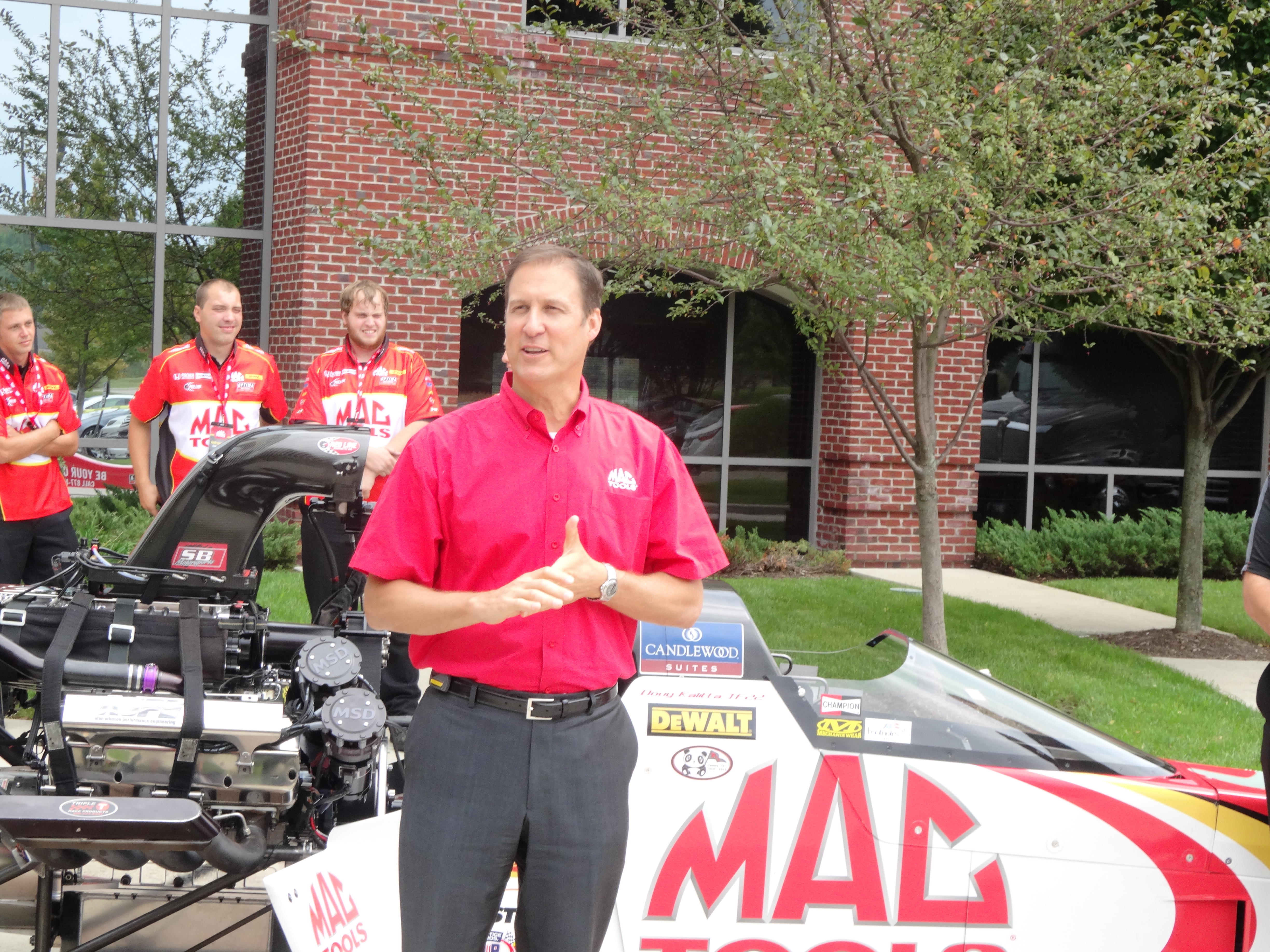 Brett Shaw welcomes attendees to the Mac Tools press conference.